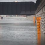 A guage shows the depth of water a an underpass on Interstate 10 which has been inundated with flooding from Hurricane Harvey on August 27, 2017<br>
